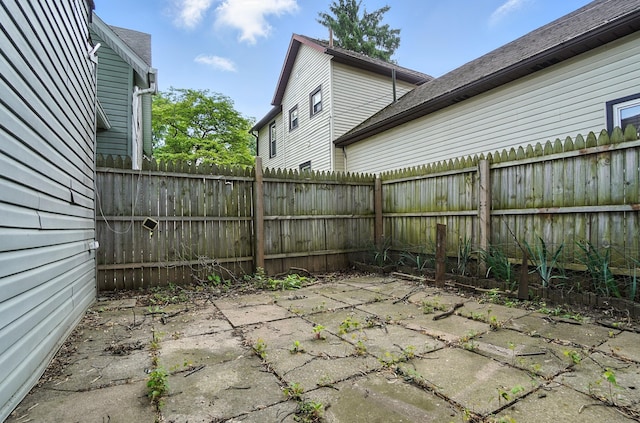 99 N Williams St, Newark, OH 43055 - fenced backyard with a patio area