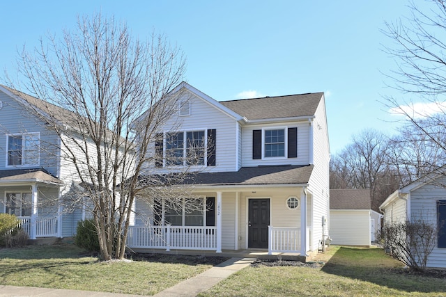 1852 Meadowlawn Dr, Columbus, OH 43219 - traditional-style home with a porch, a front yard, and roof with shingles