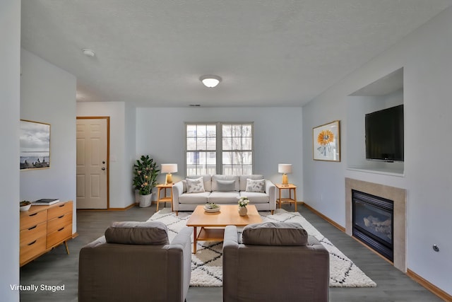 1852 Meadowlawn Dr, Columbus, OH 43219 - living room with a glass covered fireplace and wood finished floors