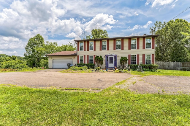 123 Deerwalk Cir, Marietta, OH 45750 - colonial house with an attached garage and driveway