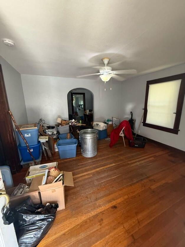289 S Walnut St, Wilmington, OH 45177 - interior space featuring hardwood / wood-style flooring, ceiling fan, and arched walkways