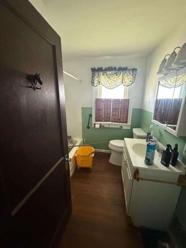 289 S Walnut St, Wilmington, OH 45177 - bathroom featuring vanity and wood finished floors