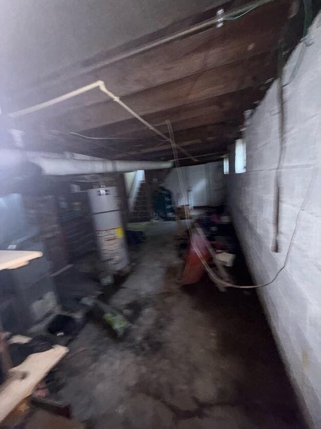 289 S Walnut St, Wilmington, OH 45177 - detailed view of gas water heater and concrete flooring