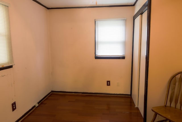 72 S Oakley Ave, Columbus, OH 43204 - unfurnished bedroom with wood finished floors and crown molding