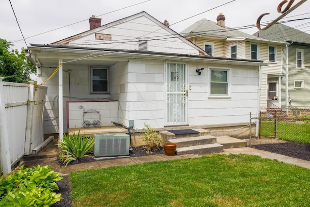 72 S Oakley Ave, Columbus, OH 43204 - rear view of property with a chimney and entry steps