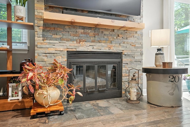 96 Executive Ct Unit B, Westerville, OH 43081 - detailed view of wood finished floors and a stone fireplace