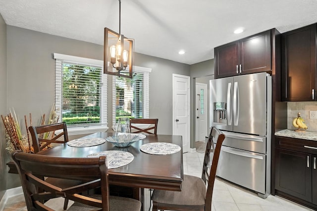 96 Executive Ct Unit B, Westerville, OH 43081 - dining room featuring a chandelier, light tile patterned flooring, and recessed lighting