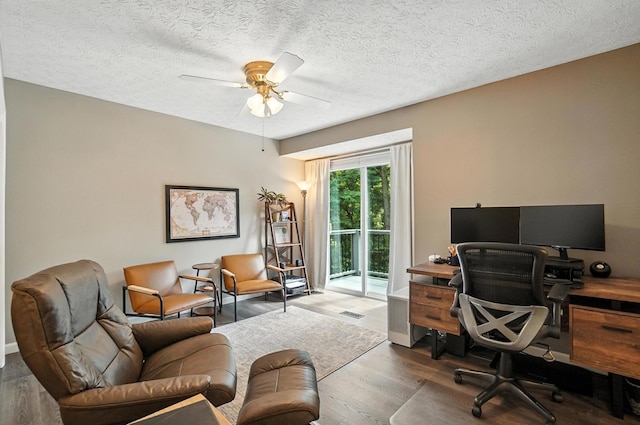 96 Executive Ct Unit B, Westerville, OH 43081 - home office featuring wood finished floors, a ceiling fan, and a textured ceiling