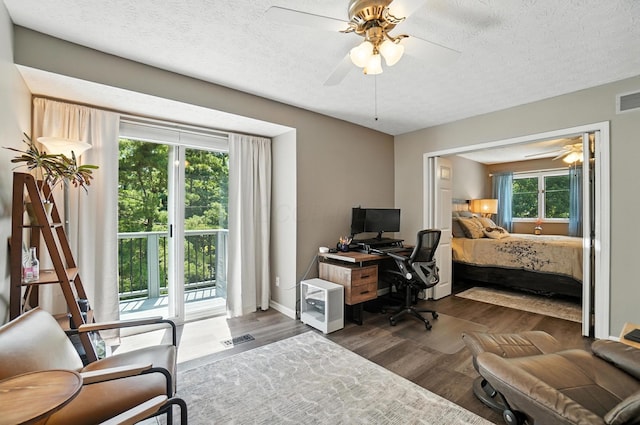 96 Executive Ct Unit B, Westerville, OH 43081 - office area with ceiling fan, wood finished floors, and a textured ceiling