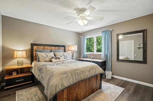 96 Executive Ct Unit B, Westerville, OH 43081 - bedroom featuring dark wood-type flooring, a textured ceiling, and a ceiling fan