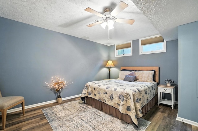 96 Executive Ct Unit B, Westerville, OH 43081 - bedroom with wood finished floors, a textured ceiling, and ceiling fan