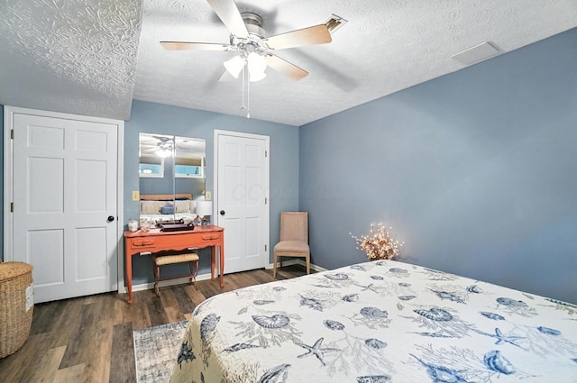 96 Executive Ct Unit B, Westerville, OH 43081 - bedroom with wood finished floors, a textured ceiling, and ceiling fan