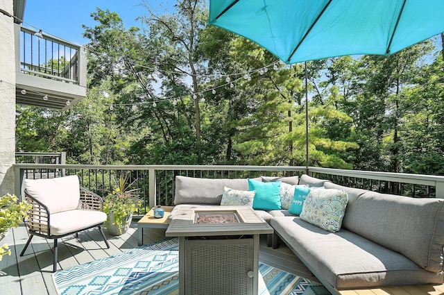 96 Executive Ct Unit B, Westerville, OH 43081 - wooden deck featuring an outdoor living space with a fire pit and view of scattered trees