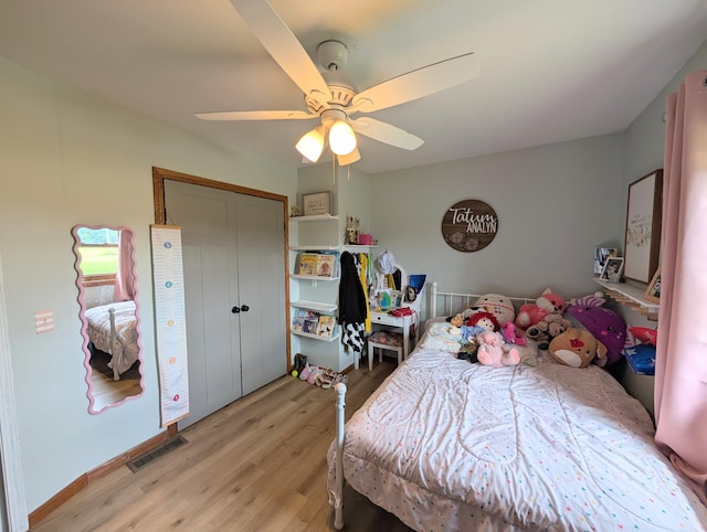3439 Rough And Ready Rd, New Concord, OH 43762 - bedroom featuring light wood finished floors, ceiling fan, and a closet