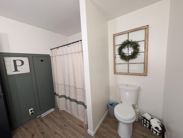 3439 Rough And Ready Rd, New Concord, OH 43762 - bathroom with wood finished floors and curtained shower