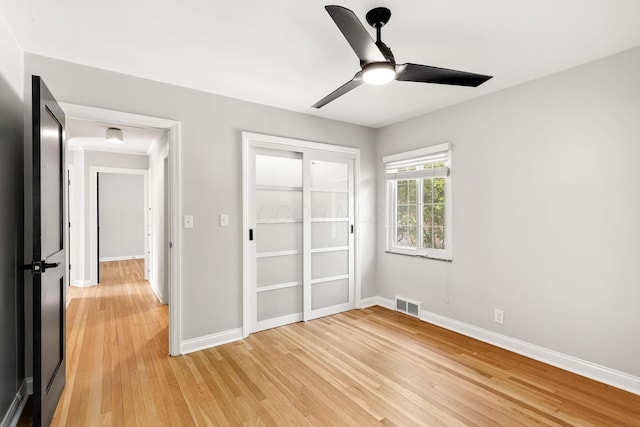 337 S Kellner Rd, Columbus, OH 43209 - unfurnished bedroom with light wood-style flooring and a ceiling fan