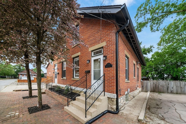 675-677 Beech St, Columbus, OH 43206 - view of front of home featuring brick siding and entry steps