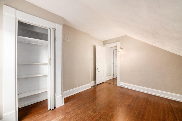 675-677 Beech St, Columbus, OH 43206 - unfurnished bedroom with wood-type flooring and baseboards