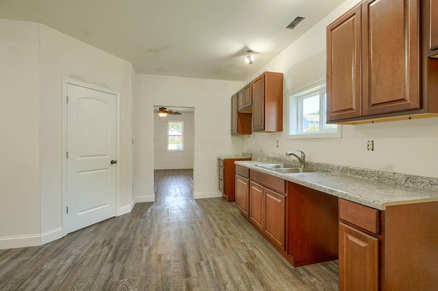 424 N Walnut St, Logan, OH 43138 - kitchen with wood finished floors, light countertops, and ceiling fan