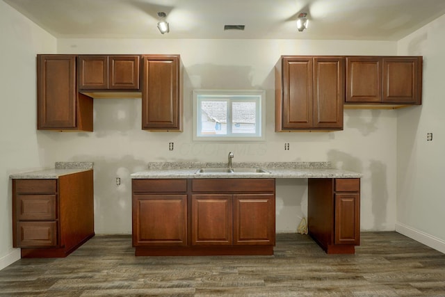 424 N Walnut St, Logan, OH 43138 - kitchen with a sink and dark wood-style floors