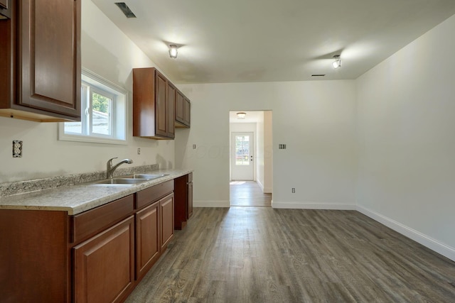 424 N Walnut St, Logan, OH 43138 - kitchen with dark wood-style floors and light countertops