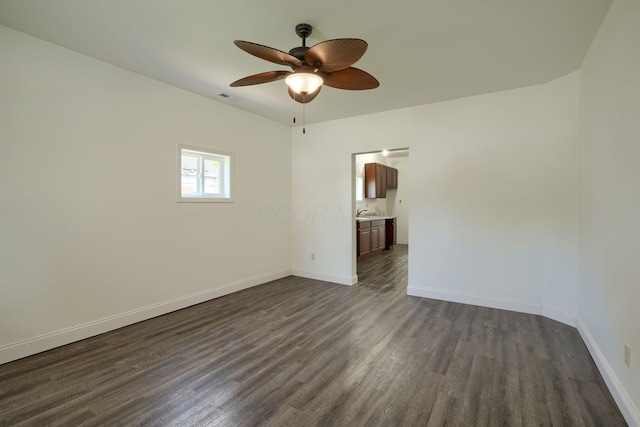 424 N Walnut St, Logan, OH 43138 - empty room featuring dark wood-style floors and ceiling fan