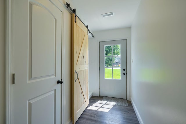 424 N Walnut St, Logan, OH 43138 - entryway with a barn door and wood finished floors