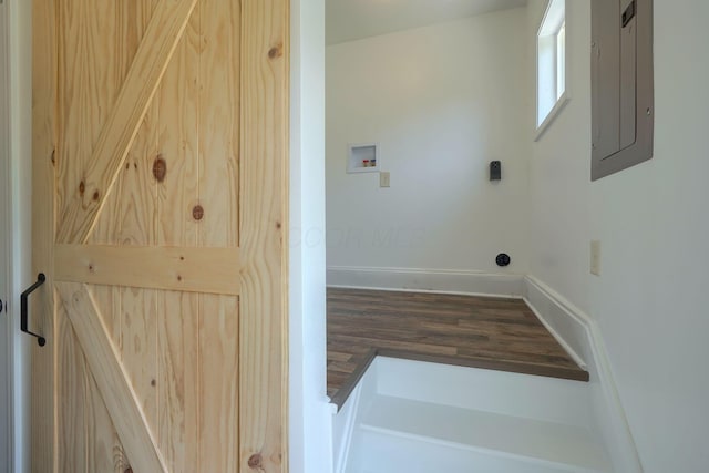 424 N Walnut St, Logan, OH 43138 - laundry room with electric panel, washer hookup, and wood finished floors