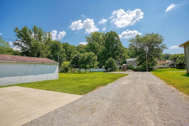 424 N Walnut St, Logan, OH 43138 - view of grassy yard with driveway
