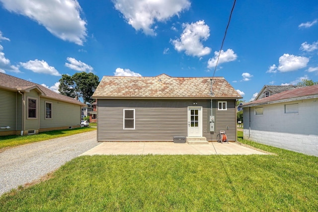 424 N Walnut St, Logan, OH 43138 - back of property featuring a patio and a lawn