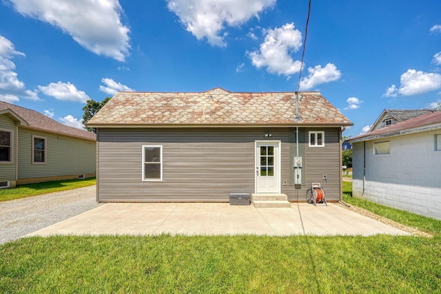 424 N Walnut St, Logan, OH 43138 - rear view of property featuring a patio area and a yard