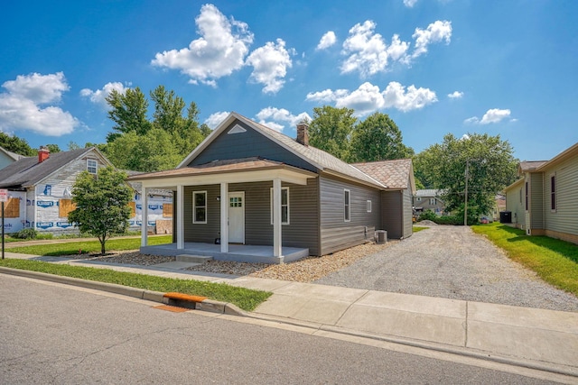 424 N Walnut St, Logan, OH 43138 - shotgun-style home featuring a porch