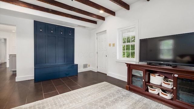 5377 Moots Run Rd, Alexandria, OH 43001 - living area featuring beam ceiling and dark tile patterned floors