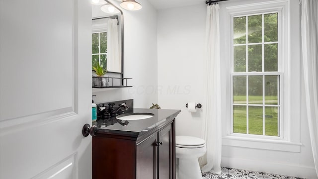 5377 Moots Run Rd, Alexandria, OH 43001 - bathroom featuring vanity, plenty of natural light, and tile patterned floors