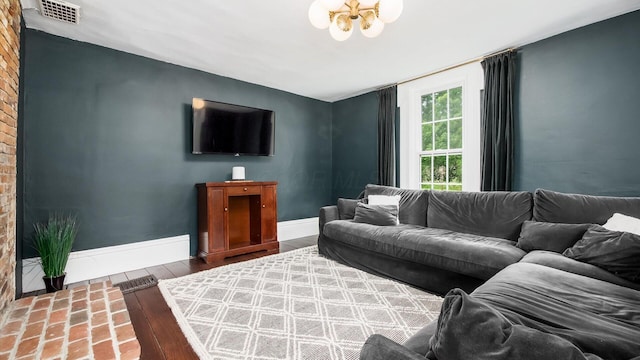 5377 Moots Run Rd, Alexandria, OH 43001 - living area with a chandelier and brick patterned flooring