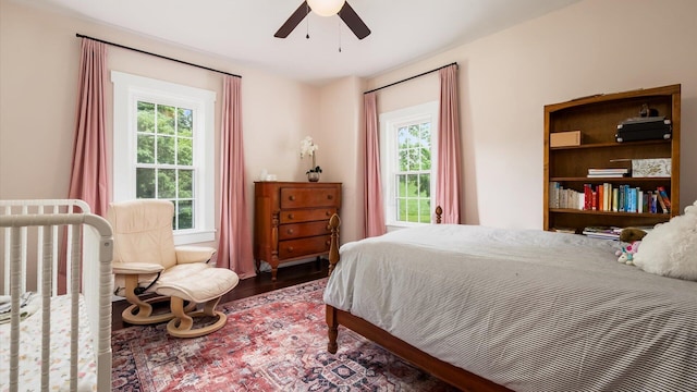 5377 Moots Run Rd, Alexandria, OH 43001 - bedroom featuring wood finished floors, multiple windows, and ceiling fan