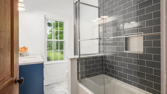 5377 Moots Run Rd, Alexandria, OH 43001 - full bathroom featuring marble finish floors, vanity, and enclosed tub / shower combo