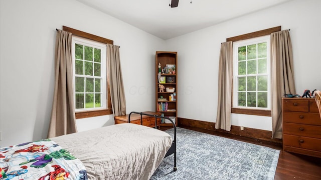 5377 Moots Run Rd, Alexandria, OH 43001 - bedroom with multiple windows, wood finished floors, and ceiling fan