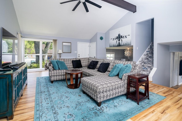 922 Afton Rd, Columbus, OH 43221 - living area featuring high vaulted ceiling, ceiling fan, wood finished floors, and beam ceiling