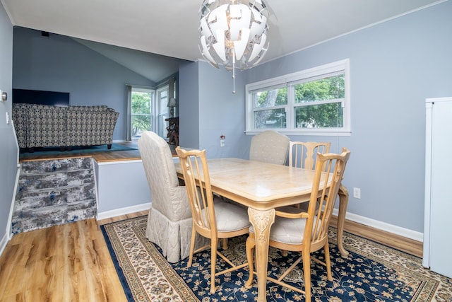 922 Afton Rd, Columbus, OH 43221 - dining room featuring wood finished floors, healthy amount of natural light, and lofted ceiling