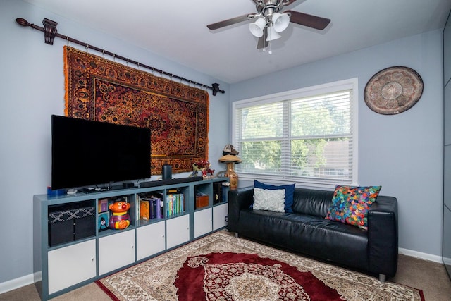 922 Afton Rd, Columbus, OH 43221 - carpeted living room featuring a ceiling fan and baseboards