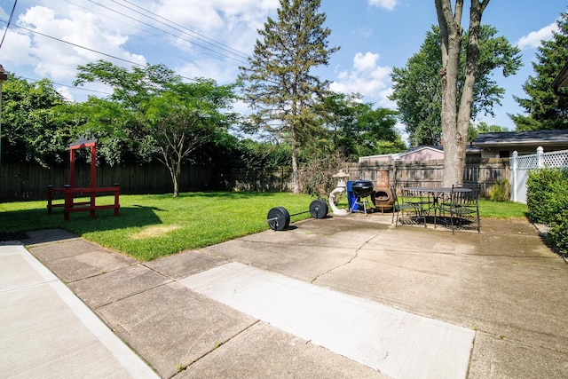 922 Afton Rd, Columbus, OH 43221 - fenced backyard with a patio and outdoor dining space