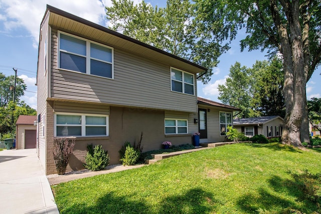 922 Afton Rd, Columbus, OH 43221 - tri-level home featuring a front yard