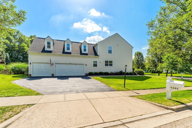 4884 Alston Grove Dr, Westerville, OH 43082 - view of front of home featuring driveway, roof with shingles, a front lawn, and an attached garage