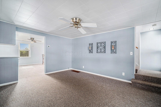 2883 Tucker Rd, Lucas, OH 44843 - carpeted empty room with a ceiling fan and stairs