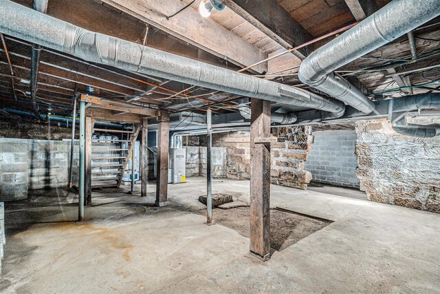 2883 Tucker Rd, Lucas, OH 44843 - unfinished basement featuring water heater