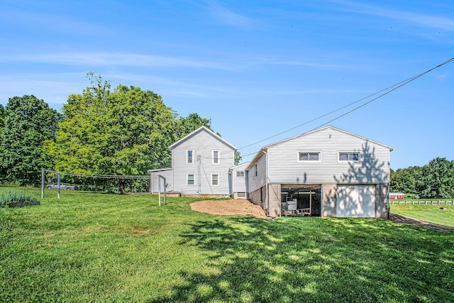 2883 Tucker Rd, Lucas, OH 44843 - back of house featuring a yard