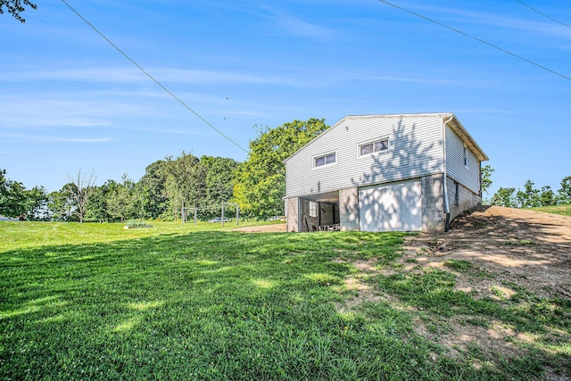 2883 Tucker Rd, Lucas, OH 44843 - view of home's exterior featuring a lawn