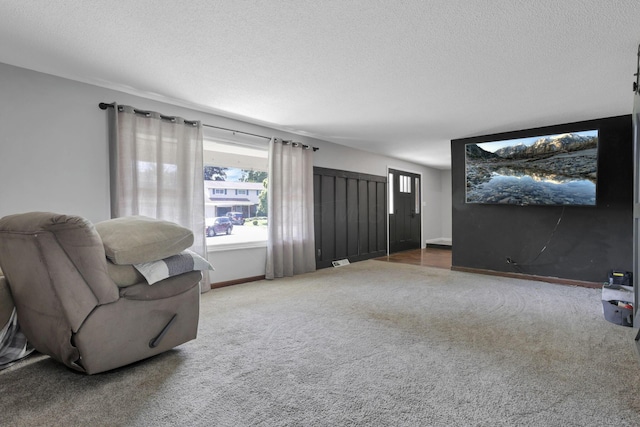 372 Depauw Ct, Columbus, OH 43230 - living area with carpet, plenty of natural light, and a textured ceiling