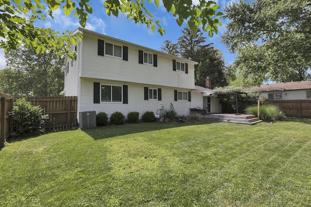 372 Depauw Ct, Columbus, OH 43230 - rear view of property featuring a fenced backyard, a deck, and a chimney